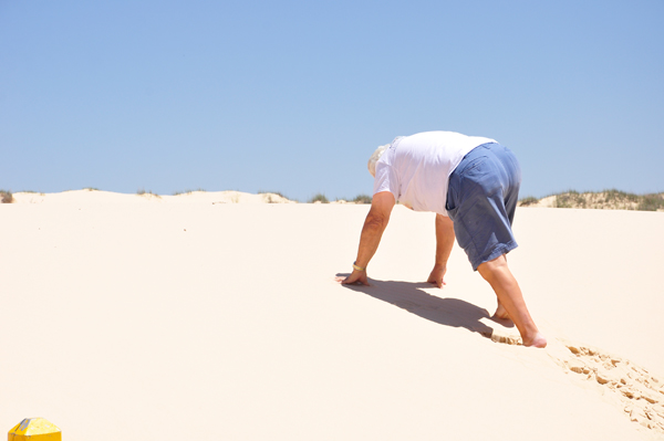 Lee crawling up the sand hill